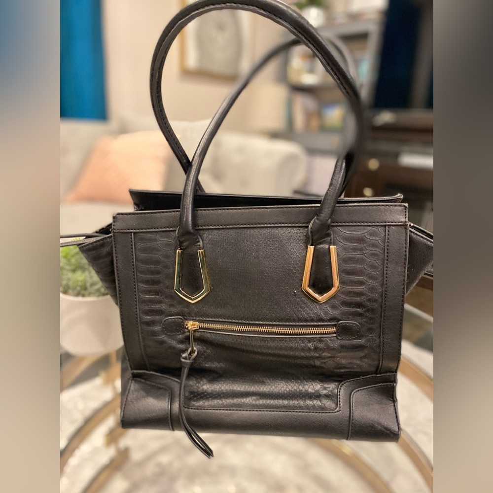 Mossimo black laptop bag or handbag with gold tone accents with zip top used.